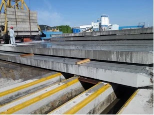 Sprinkling water on concrete piles for maintenance