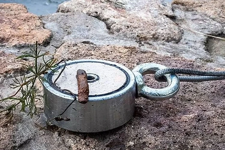 Magnet fishing with a double sided fishing magnet Magnet fishing with a double sided fishing magnet
