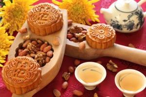 Eating mooncakes during the Mid-Autumn Festival